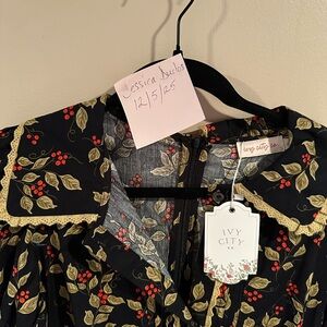 Ivy City Co Holly Berry Print Black Dress with Red and Green Floral Design